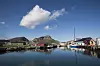Bilde av båter, havn og fjell i Verøy. Foto: Berit Roald/NTB