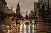Regn og trafikk i Santiago i Chile. Foto: AP Photo