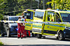 Bildet viser ambulansen på stedet der en gutt ble påkjørt av en varebil mandag. Foto: Terje Pedersen / NTB