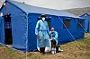 Bilde av helsearbeidere i Kongo. Foto: AFP