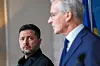 Volodymyr Zelenskyj og Jonas Gahr Støre i profil under en pressekonferanse.
