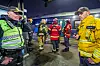 Brannmannskaper og annet beredskapspersonell i uniform på Lillestrøm stasjon.