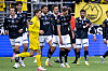 Viking-spillere feirer på banen etter scoring mot Bodø/Glimt, med en keeper i gult blant spillerne.