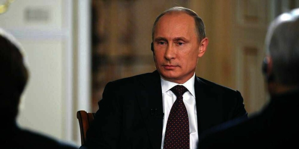 STØTTE: President Vladimir Putin sier at Russland kan ombestemme seg og støtte et angrep på Syria. Bildet viser Russlands president Vladimir Putin som intervjues.