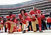 FILE - In this Oct. 2, 2016 file photo, from left, San Francisco 49ers outside linebacker Eli Harold, quarterback Colin Kaepernick and safety Eric Reid kneel during the national anthem before an NFL football game against the Dallas Cowboys in Santa Clara, Calif. An arbitrator is sending Kaepernick's grievance with the NFL to trial, denying the league's request to throw out the quarterback's claims that owners conspired to keep him out of the league because of his protests of social injustice. (AP Photo/Marcio Jose Sanchez, File)