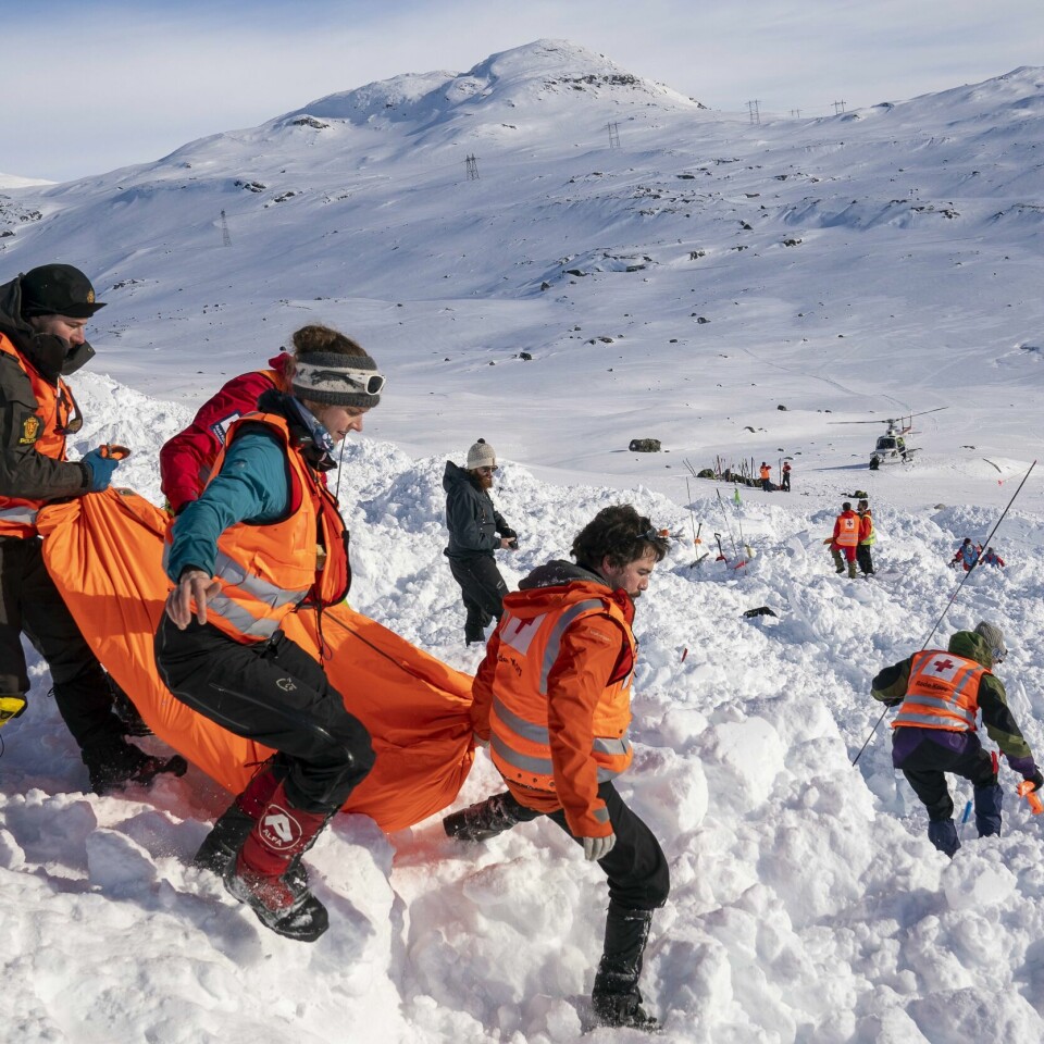 TRAVELT: De frivilliger er viktige for mange oppdrag i det norske samfunnet. Snart er det påske. Da hjelper flere med å redde folk som går seg bort på fjellet eller blir tatt av snøskred. Her fra trening i søk og redning i vinterfjellet.Foto: Heiko Junge / NTB