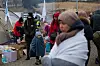 Bildet viser flyktninger fra Ukraina på grenseovergangen i Medyka i Polen.