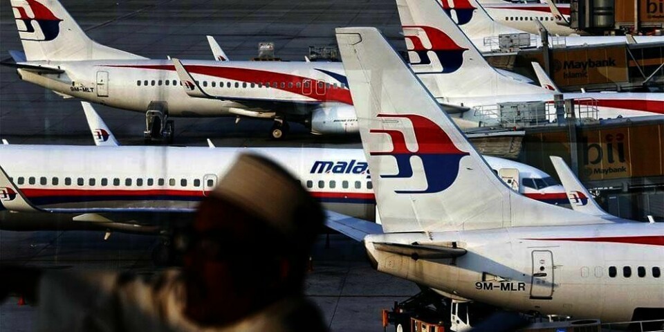 KONKURS: Flyselskapet Malaysia Airlines sliter med dårlig økonomi og er konkurs. 20.000 ansatte må slutte i jobbene sine. Men 14.000 av dem vil få tilbud om ny jobb i nytt selskap.