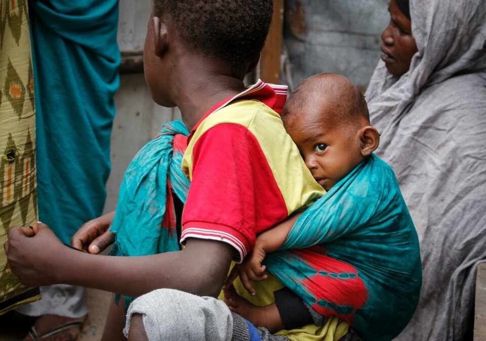 In this photo taken Thursday, March 26, 2020, residents live in crowded conditions in the Sayidka camp for internally displaced people in Mogadishu, Somalia. The country has only a handful of confirmed cases of the new coronavirus so far but residents of the camp, who have already fled drought and violence from the Islamist al-Shabab militant group, say they are fearful of the virus and feel vulnerable. (AP Photo/Farah Abdi Warsameh) In this photo taken Thursday, March 26, 2020, residents live in crowded conditions in the Sayidka camp for internally displaced people in Mogadishu, Somalia. The country has only a handful of confirmed cases of the new coronavirus so far but residents of the camp, who have already fled drought and violence from the Islamist al-Shabab militant group, say they are fearful of the virus and feel vulnerable. (AP Photo/Farah Abdi Warsameh)