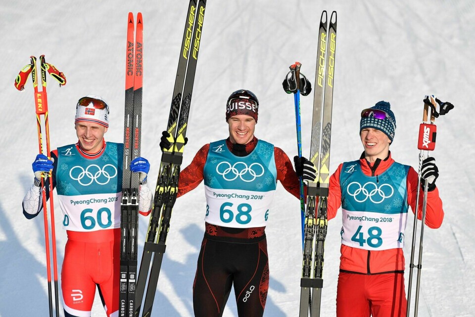 PALLEN: Simen Hegstad Krüger, Dario Cologna og Denis Spitsov var best på 15 kilometer fri teknikk.