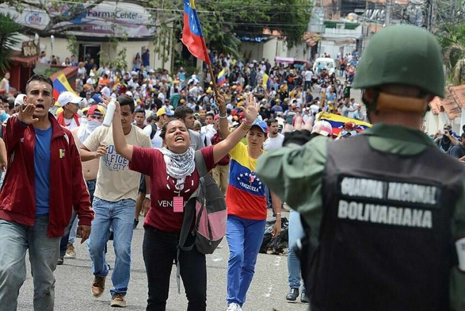 PROTESTER: Folk i Venezuela vil at presidenten deres skal slutte. Onsdag var det store demonstrasjoner i hele landet.