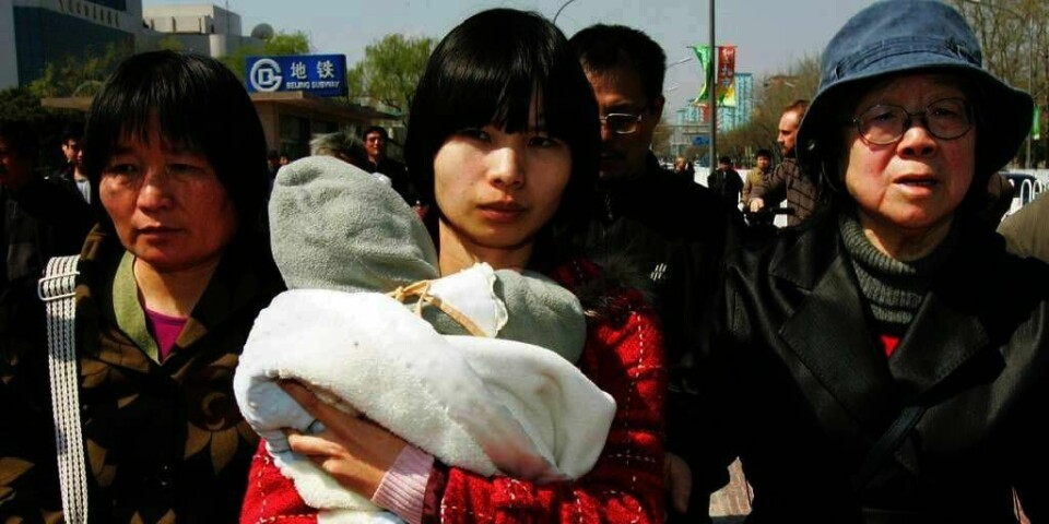 SAVNET: Zeng Jinyan (midten) er gift med den kinesiske aktivisten Hu Jia. Nå er hun borte.