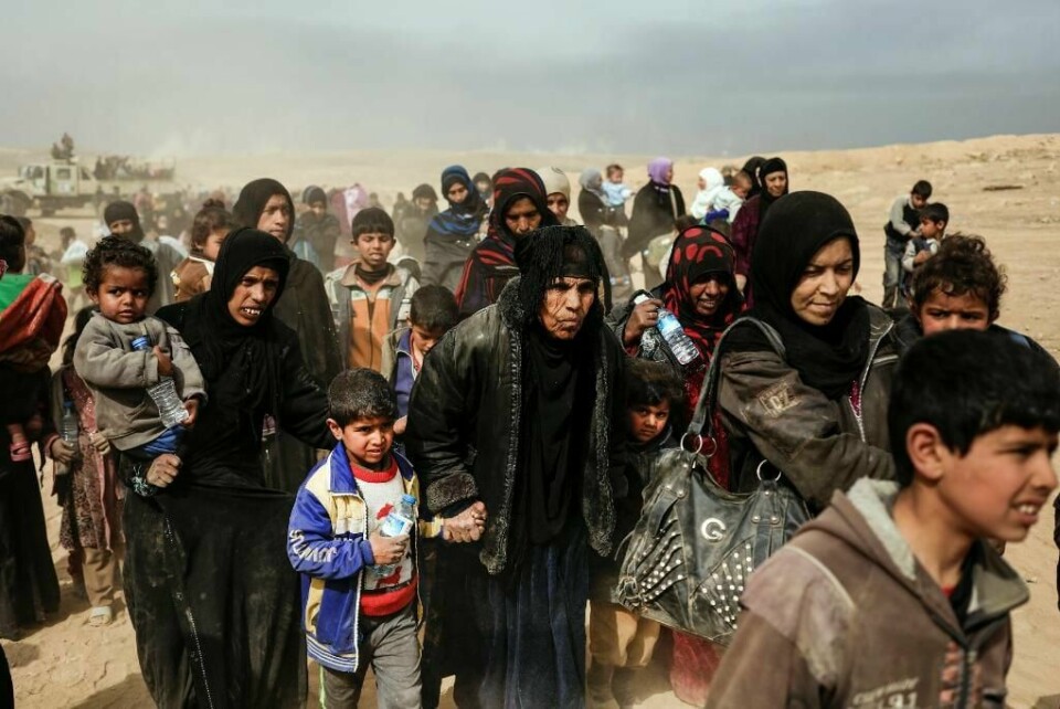 FLYKTER: Mennesker har flyktet fra byen Mosul. Terrorgruppa IS bruker mennesker til å beskytte seg i krigen.