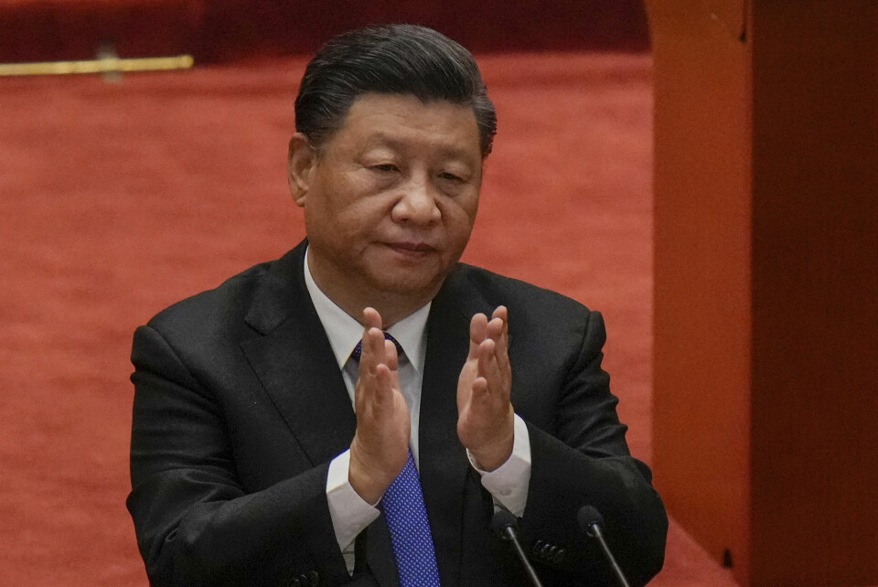 PRESIDENT: Kinas president, Xi Jinping, sier Kina kommer til å gjenforenes med Taiwan. En gjenforening med Taiwan «vil og kan bli realisert», sa Kinas president Xi Jinping i en tale i Folkets store hall i Beijing lørdag. Foto: Andy Wong / AP / NTB