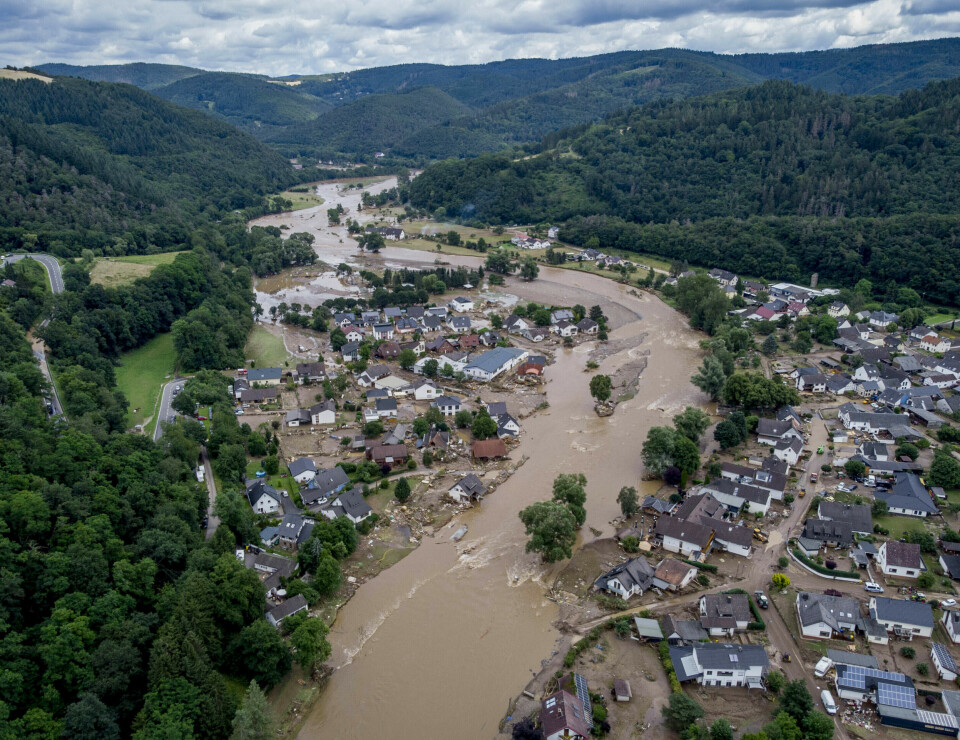 FLOM: Over 100 mennesker døde av flommen i Tyskland i juli. Store oversvømmelser i Tyskland var en av mange naturkatastrofer som rammet verden i 2021. Foto: Michael Probst / AP / NTB