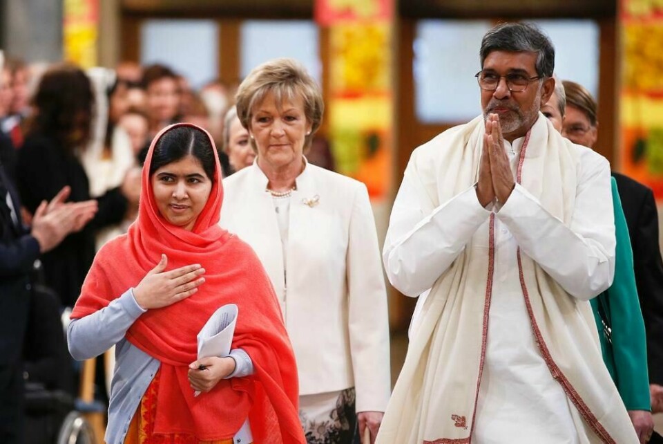 KANDIDAT: Inger-Marie Ytterhorn ( midten) har tatt imot fredsprisvinnere som Malala Yousafzai og Kailash Satyarthi . HJun vil gjerne fortsette for Frp i Nobelkomiteen. Da blir Carl I. Hagen skuffet.
