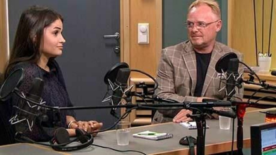 TRØBBEL: Bildet viser fiskeriminister Per Sandberg og hans norsk-iranske kjæreste Bahareh Letnes. De ble intervjuet i programmet Dagsnytt 18 på NRK. Opposisjonen vil ha flere svar om Sandbergs reise til Iran.