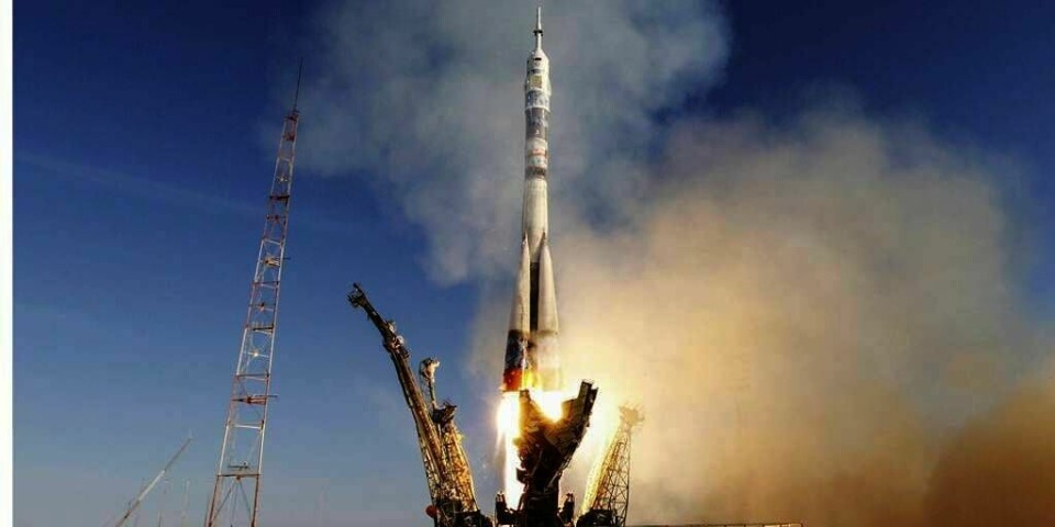 VERDENSROMMET: OL-fakkelen er på reise ut i verdensrommet. Den var med en romkapsel som ble skutt ut på torsdag.