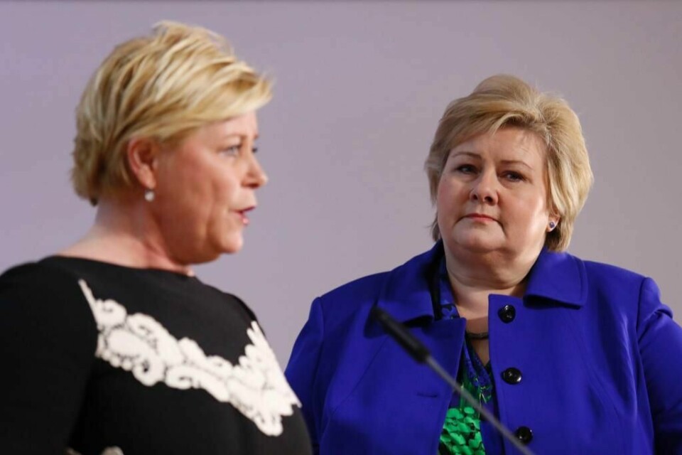 REGJERING: Finansminister Siv Jensen og statsminister Erna Solberg er fra Høyre og Frp. Forskere vil ikke stemme på dem.