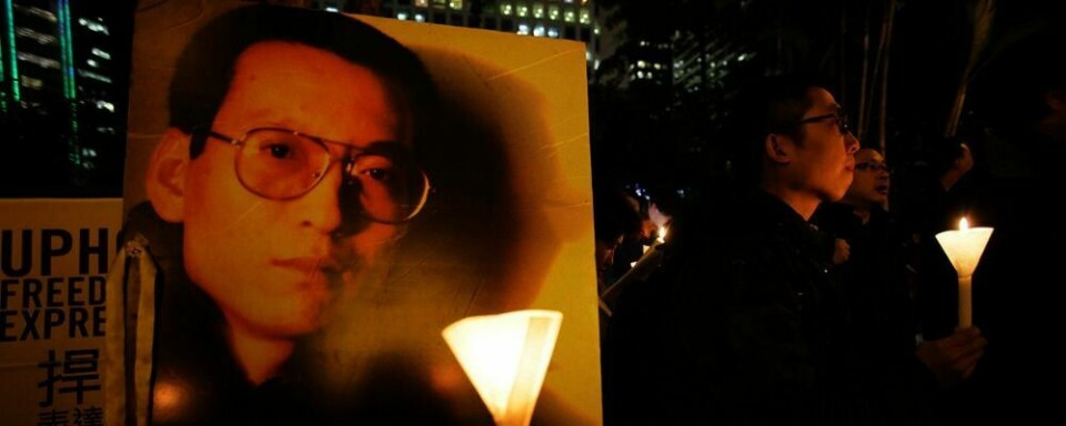 VANT: Kinesiske Liu Xiaobo har fått Nobels fredspris 2010. Han ønsker demokrati i Kina. Dette bildet er fra en demonstrasjon for å frigi Xiaobo i januar.