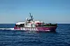 Louise Michel rescue vessel, a former French patrol boat currently manned by activists and funded by the renowned artist Banksy, is seen in the Central Mediterranean sea, at 50 miles south from Lampedusa, Friday, Aug. 28, 2020. A Berlin-based group says it has begun migrant rescue operations in the Mediterranean Sea with a bright pink former navy vessel sponsored by British artist Banksy. The group operating the MV Louise Michel, a sleek 30-meter (98-foot) ship named after a 19th century French feminist and anarchist, said late Thursday that it rescued 89 from an inflatable boat in distress. (AP Photo/Santi Palacios)