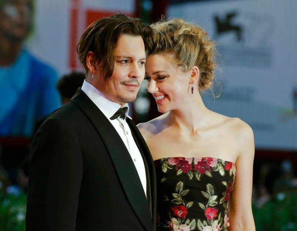 SKILLES: Amber Heard vil skilles fra Johnny Depp. De to har vært gift i et år. Her er de to på premieren av filmen «The Danish Girl» i Italia i 2015.