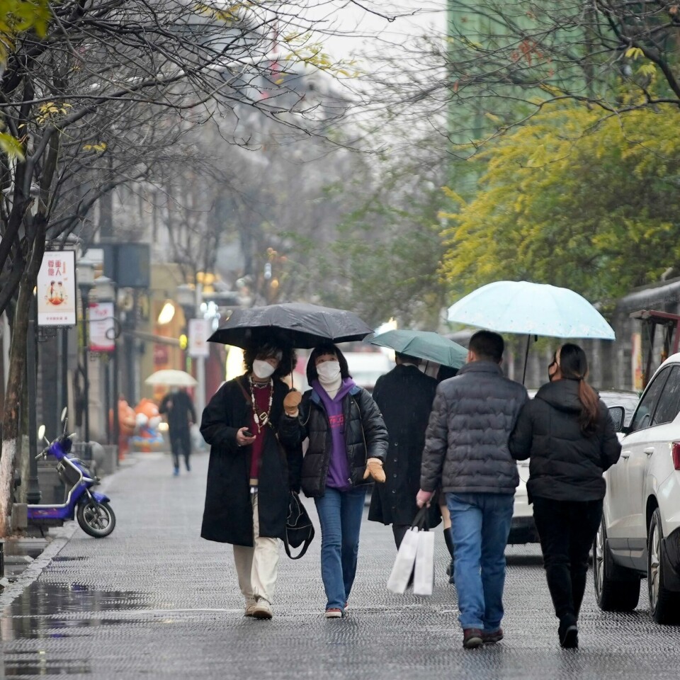 WUHAN: Nesten 1 million personer i Wuhan må isolere seg. Bildet er tatt ved en tidligere anledning. Bildet viser folk i Wuhan.