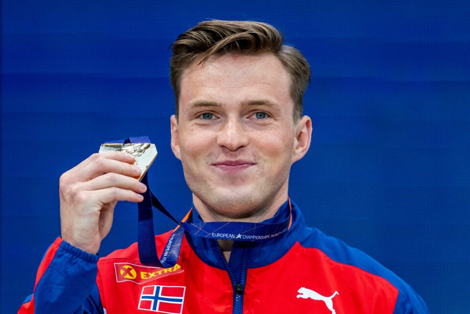 SPRÅK: Sunnmøring og friidrettsutøver Karsten Warholm vant pris for dialekten sin. Bildet er fra august da han tok gull på 400 meter hekk under EM i friidrett i München på Olympiastadion. Sunnmøring og friidrettsutøver Karsten Warholm mottar dialektpris. Bildet er fra august da han tok gull på 400 meter hekk under EM i friidrett i München på Olympiastadion. Arkivfoto: Javad Parsa / NTB