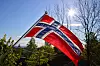 Norsk flagg som vaier i vinden. Foto: Ørn E. Borgen / NTB