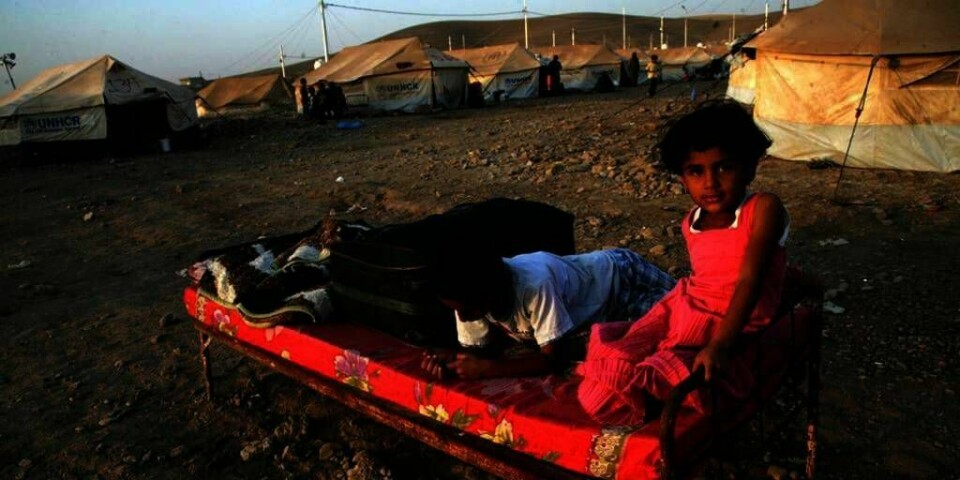 BARN: 1 million barn har flyktet fra Syria. Årsaken er borgerkrigen i landet. Her er to barn i en flyktningleir i Syria.