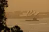 The Sydney Opera House is seen as smoke haze from bushfires drifts over the CDB in Sydney, Australia, November 12, 2019. AAP Image/Paul Braven/via REUTERS ATTENTION EDITORS - THIS IMAGE WAS PROVIDED BY A THIRD PARTY. NO RESALES. NO ARCHIVE. AUSTRALIA OUT. NEW ZEALAND OUT. NO COMMERCIAL OR EDITORIAL SALES IN NEW ZEALAND. NO COMMERCIAL OR EDITORIAL SALES IN AUSTRALIA.