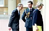Theresa May arrives with her husband Philip May, left, at Buckingham Palace, London, Wednesday, July 13, 2016, where she will have an audience with Queen Elizabeth II to formally accept the position of Britain's Prime Minister. Earlier David Cameron resigned from the post during his meeting with the queen. (Steve Parsons/Pool Photo via AP)