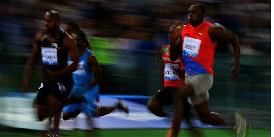 REKORD: Løperen Usain Bolt (foran i rød trøye) kan slå den gamle rekorden på 100 meter på Bislett. Her er han under et mesterskap i Roma i Italia i mai.