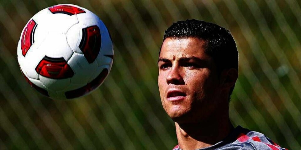 STJERNE: Cristiano Ronaldo er en av Portugals største stjerner i fotball. Kanskje vil han ikke klare å skjerpe seg mot lille Norge. Lørdag spiller de to lagene mot hverandre i Portugals hovedstad Lisboa.