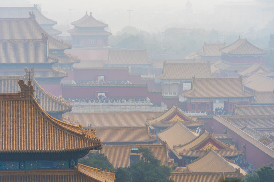 FÆRRE FOLK: Kina var lenge verdens mest folkerike land. Bildet viser hustak i Beijing i Kina. Foto: Heiko Junge / NTB