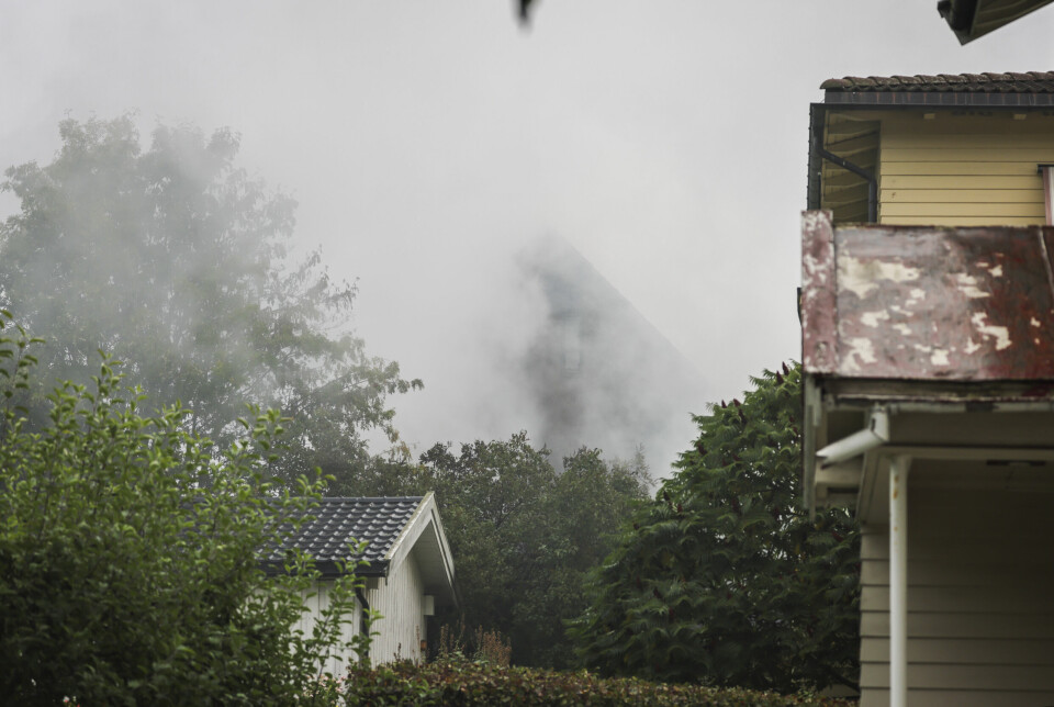 SAVNET: Fire personer er savnet etter brann i et hus i Hamar.